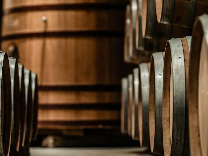 Oak barrels ageing in a cellar